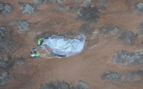 Japanese Space Project lands in prohibited military land on Sunday night still attached to it's parachute - Photo by : REUTERS