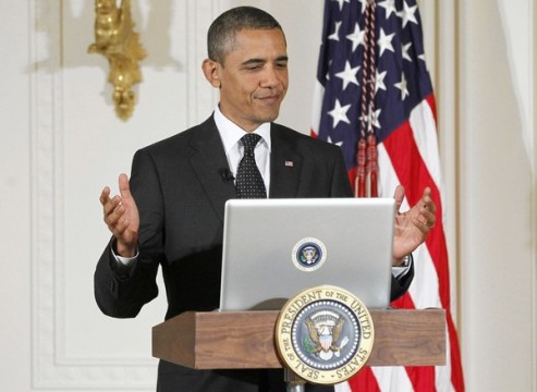 President Obama conducts the first Twitter town hall at the White House's East Room.