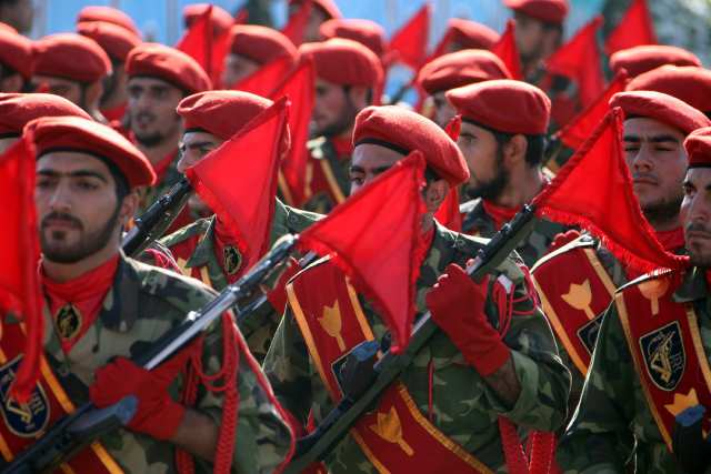 Iranian Troops march some place