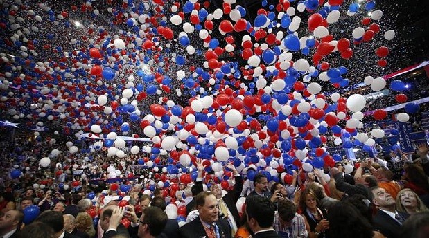 Balloons fall as Republican presidential nominee Mitt Romney and Republican vice presidential nominee, Rep. Paul Ryan's families take the stage at the 