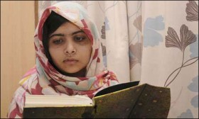 Photo of Malala released by Queen Elizabeth Hospital showing her reading a book. File Pic