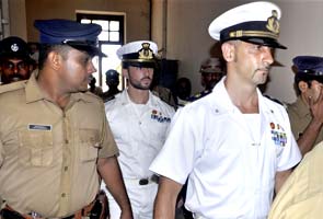 Italian marines being escorted to court in India by Indian policemen. File Pic