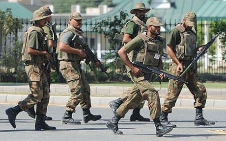  Pakistan security men in action. File Pic