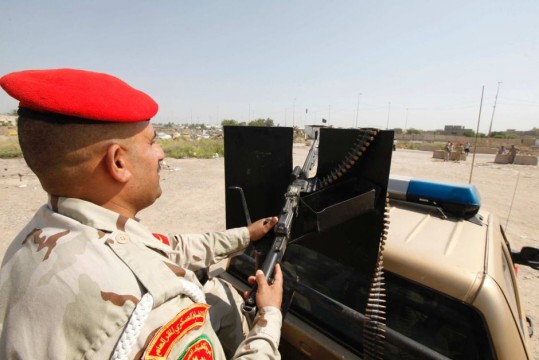 An Iraqi security man maintaining vigil.